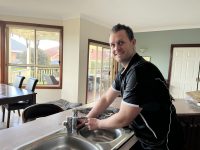 Stuart installing tap