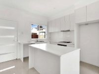 Experience modern living in our beautifully designed Granny Flats, featuring top and bottom cupboards in elegant ‘Dulux Casper White Quarter’ (Semi-Gloss) for a clean, sophisticated look. The kitchen is enhanced with a ‘Luna White’ stone bench and a stylish ‘White Subway’ splash back, creating a bright and welcoming space. Enjoy the comfort of ‘Beige Polished Porcelain floor tiles and walls painted in ‘Dulux Lexicon Quarter’, combining timeless style with contemporary finishes to make your Granny Flat truly feel like home.
