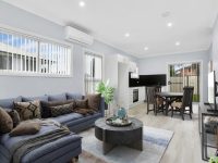 Discover our beautifully designed Granny Flat kitchens, featuring premium finishes to elevate your living space. Enjoy the elegant ‘Dulux Highgate’ wall colour paired with a sleek ‘Black Matt’ Subway splashback and bring natural light in with ‘Terrace’ coloured blinds. Storage is stylish thanks to ‘Dulux Casper White Quarter’ cupboards, while the 20mm Caesarstone Galaxy Black stone benchtops offer both durability and sophistication.