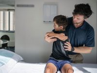 Osteopath Jerome Smith treating an active child at Above Health in Hornsby